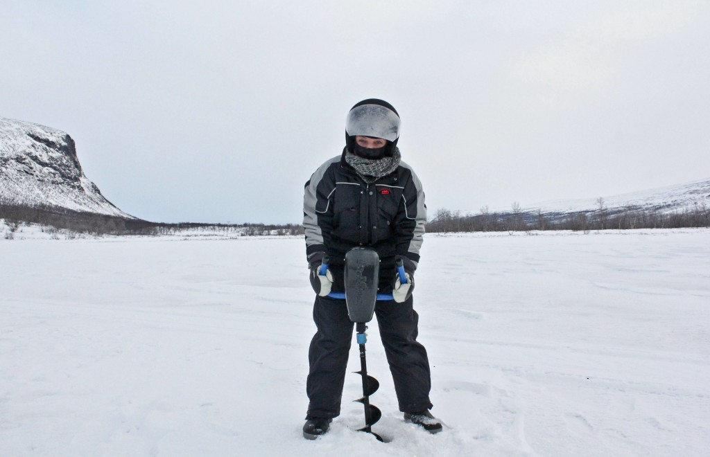 drilling a hole in the ice